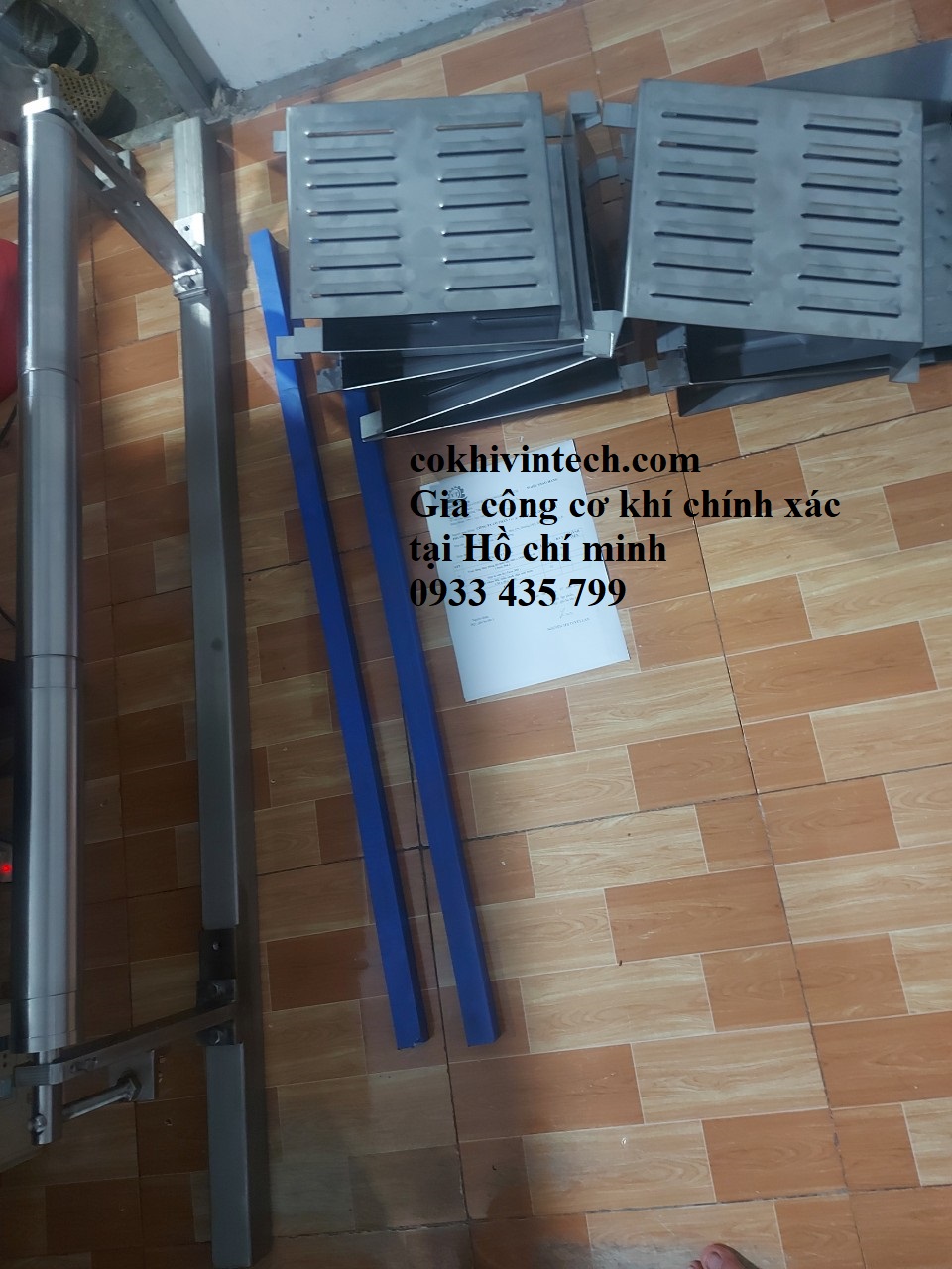 Trục tăng đưa + Cạt te cửa lò